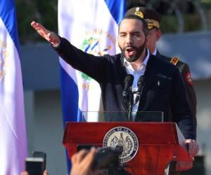 Salvadoran President Nayib Bukele gestures as he speaks to supporters during a protest outside the Legislative Assembly to make pressure on deputies to approve a loan to invest in security, in San Salvador on February 9, 2020. (Photo by MARVIN RECINOS / AFP)