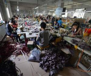 El índice, que refleja la actividad industrial en fábricas y talleres, es un termómetro de la salud de la segunda economía del mundo. (Foto: AFP).