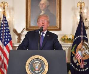 US President Donald Trump addresses the nation on the situation in Syria April 13, 2018 at the White House in Washington, DC. Trump said strikes on Syria are under way. / AFP PHOTO / Mandel NGAN