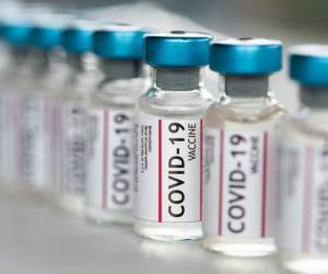 Covid-19 Coronavirus Vaccine vials in a row macro close up