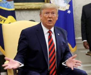 WASHINGTON, DC - SEPTEMBER 20: U.S. President Donald Trump speaks in the Oval Office while meeting with Australian Prime Minister Scott Morrison September 20, 2019 in Washington, DC. Trump announced that the U.S. has issued new sanctions on Iran's central bank at the 'highest level'. Win McNamee/Getty Images/AFP