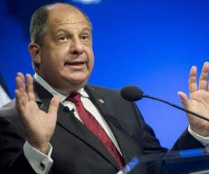 President Luis Guillermo Solis of Costa Rica speaks about immigration at the Woodrow Wilson Center in Washington, DC, August 22, 2016.Solís met earlier in the day with US Vice President Joe Biden at the White House to discuss regional security, irregular migration and renewable energy. / AFP PHOTO / SAUL LOEB