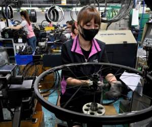 FOTO SAM YEH / AFP / TO GO WITH Health-virus-Taiwan-Europe-US-industry-bicycle,FOCUS by Sean Chang and Amber Wang