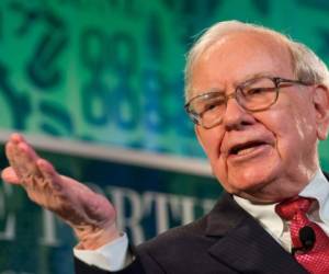 Shareholders pass an illustration of Warren Buffett, CEO of Berkshire Hathaway, during the 2019 annual shareholders meeting in Omaha, Nebraska, May 3, 2019. (Photo by Johannes EISELE / AFP)