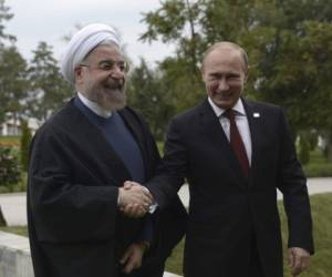 Vladimir Putin y Hassan Rohani. Esta relación terminará complicando a Occidente. (Foto: Archivo)