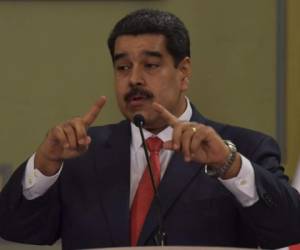 Venezuelan President Nicolas Maduro speaks during a joint press conference with Turkish President Recep Tayyip Erdogan (out of frame) at Miraflores Presidential Palace in Caracas, on December 3, 2018. (Photo by YURI CORTEZ / AFP)