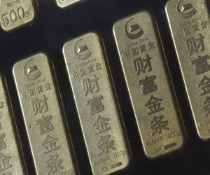 <i>Varios lingotes de oro expuestos en una tienda de Pekín (China). EFE/How Hwee Young</i>