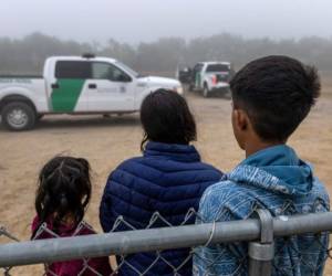 LA JOYA, TEXAS - APRIL 10: Unaccompanied minors wait to be processed by U.S. Border Patrol agents near the U.S.-Mexico border on April 10, 2021 in La Joya, Texas. A surge of immigrants crossing into the United States, including record numbers of children, continues along the southern border. (Photo by John Moore/Getty Images)