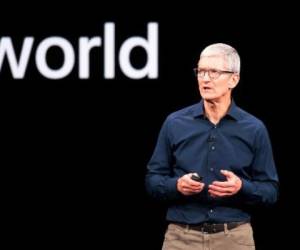 Apple CEO Tim Cook speaks during an Apple event on September 12, 2018, in Cupertino, California. - New iPhones set to be unveiled Wednesday offer Apple a chance for fresh momentum in a sputtering smartphone market as the California tech giant moves into new products and services to diversify.Apple was expected to introduce three new iPhone models at its media event at its Cupertino campus, notably seeking to strengthen its position in the premium smartphone market a year after launching its $1,000 iPhone X. (Photo by NOAH BERGER / AFP)