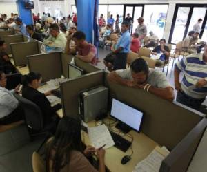 Empresarios creen que el nuevo impuesto provoca el cierre de empresas. (Foto: laprensa.hn).