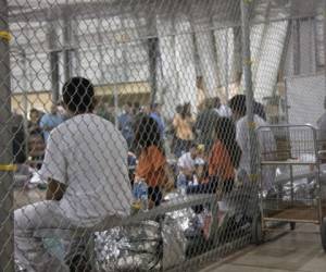 MCALLEN, TX - JUNE 17: In this handout photo provided by U.S. Customs and Border Protection, U.S. Border Patrol agents conduct intake of illegal border crossers at the Central Processing Center on June 17, 2018 in McAllen, Texas. (Photo by U.S. Customs and Border Protection via Getty Images)