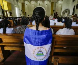 Catholics participate of a mass demanding the freedom of political prisoners in Managua's Cathedral, in Managua on October 21, 2018. (Photo by INTI OCON / AFP)