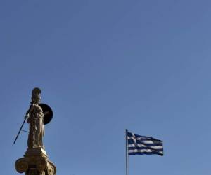 El FMI cree que la salida de Grecia sería mucho peor para el país que lo que puede suponer para el resto de países de la zona euro. (Foto: AFP).