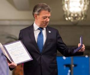 'Señoras y señores: Hay una guerra menos en el mundo, ¡y es la de Colombia!', zanjó el presidente colombiano. (Foto: AFP).