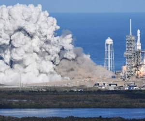 The SpaceX Falcon Heavy launches from Pad 39A at the Kennedy Space Center in Florida, on February 6, 2018, on its demonstration mission.The world's most powerful rocket, SpaceX's Falcon Heavy, blasted off Tuesday on its highly anticipated maiden test flight, carrying CEO Elon Musk's cherry red Tesla roadster to an orbit near Mars. Screams and cheers erupted at Cape Canaveral, Florida as the massive rocket fired its 27 engines and rumbled into the blue sky over the same NASA launchpad that served as a base for the US missions to Moon four decades ago. / AFP PHOTO / JIM WATSON