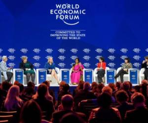 (FromL) The Co-Chairs of the annual World Economic Forum (WEF) International Monetary Fund (IMF) Managing Director Christine Lagarde and Prime Minister of Norway Erna Solberg, IBM Chairperson and CEO Ginni Rometty, Founder and Chair of Mann Deshi Foundation Chetna Sinha, European Organization for Nuclear Research (CERN) Director-General Fabiola Gianotti, International Trade Union Confederation (ITUC) General Secretary Sharan Burrow and ENGIE CEO Isabelle Kocher attend a session of the annual World Economic Forum (WEF) on January 23, 2018 in Davos, eastern Switzerland. / AFP PHOTO / Fabrice COFFRINI