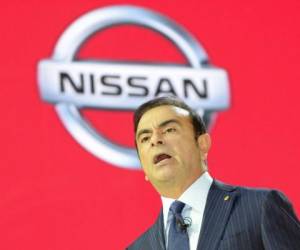 (FILES) In this file photo taken on November 20, 2013 then-Nissan Motor president Carlos Ghosn speakes during a press briefing at the company's booth at the Tokyo Motor Show in Tokyo. - Carlos Ghosn will learn his fate on January 21, 2019 as a Tokyo court rules on his bail request after he vowed to remain in Japan if released and offered to provide more collateral. The ousted Nissan boss has pleaded for bail after languishing in custody for 64 days as he fights charges of financial misconduct that he strenuously denies. (Photo by TORU YAMANAKA / AFP)