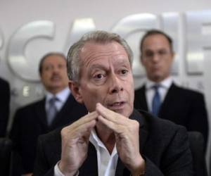 'Si no renuncia, hay posibilidad de un paro nacional', advirtieron los empresarios. Reclamaron a CICIG enjuiciar a empresarios que estén involucrados en red de defraudación fiscal que dirigía Juan Carlos Monzón. (Foto: AFP)