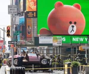 NEW YORK, NY - MAY 18: A wrecked car sits in the intersection of 45th and Broadway in Times Square, May 18, 2017 in New York City. According to reports there were multiple injuries and one fatality after the car plowed into a crowd of people. Drew Angerer/Getty Images/AFP