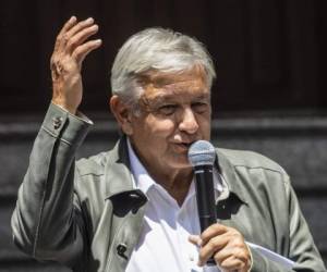 Mexico's President-elect Andres Manuel Lopez Obrador speaks during a press conference at his party's headquarters in Mexico City on July 23, 2018. / AFP PHOTO / Pedro PARDO