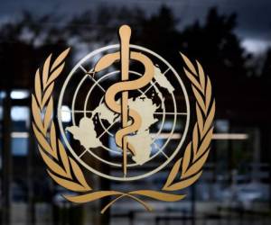 (FILES) In this file photo taken on March 09, 2020, the logo of the World Health Organization (WHO) at the its headquarters in Geneva. - The US is seeking to 'fundamentally change' WHO amid threats to withhold contributions in the midst of the coronavirus pandemic, Pompeo said April 14, 2020. US President Donald Trump has promised an announcement this week on US funding to the UN body on the forefront of the crisis. The US is the top donor to the WHO, offering $400 million in 2019. (Photo by Fabrice COFFRINI / AFP)