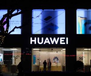 Shanghai/China-April 2020: Facade of HUAWEI flagship store at night. A Chinese Electronic brand