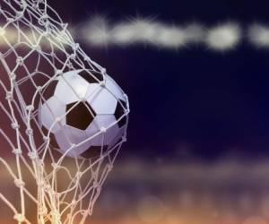 Soccer ball hit the net,success goal concept on stadium