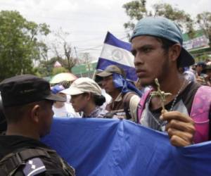 Manifestantes en contra de la Ley 840 y de la construcción del Gran Canal en La Tonga, Juigalpa. AFP PHOTO / INTI OCON