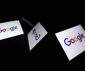 (FILES) This file photo illustration picture shows the US multinational technology and Internet-related services company Google logo displayed on a tablet in Paris on February 18, 2019. - US President Donald Trump revived his criticism of Google on August 6, 2019, referencing a fired engineer who claimed the internet giant was working against his re-election. The latest diatribe from Trump was based on allegations voiced by a former Google engineer interviewed on Fox News.'I watched Kevin Cernekee, a Google engineer, say terrible things about what they did in 2016 and that they want to 'Make sure that Trump losses in 2020,'' Trump said in a tweet Tuesday. (Photo by Lionel BONAVENTURE / AFP)