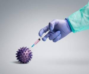 Health worker injecting vaccine into a pathogen like viruses and bacteria