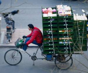 El crecimiento económico de China fue del 7,3% en el tercer trimestre, su nivel más bajo en 5 años. La meta de Pekín era crecer en torno al 7,5% del PIB en 2014, pero los analistas prevén que será inferior. (Foto: AFP).