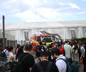 <i>Las llamas se desataron en un punto de la llamada 'Zona Azul', administrada y controlada por las Naciones Unidas, y donde se encuentran las salas de reunión y los diversos pabellones de los países y organizaciones internacionales que participan en la cita. EFE/ Andre Borges</i>