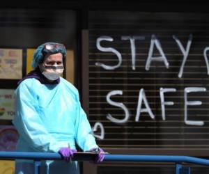 JERICHO, NEW YORK - APRIL 06: A Medical professional looks on at a drive-thru coronavirus testing site run by ProHealth Care on April 06, 2020 in Jericho, New York. The World Health Organization declared coronavirus (COVID-19) a global pandemic on March 11th. Al Bello/Getty Images/AFP