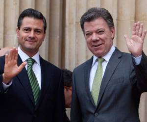 Los presidentes Enrique Peña Nieto (México) y Juan Manuel Santos (Colombia), países observadores del SICA. (Foto: Archivo).