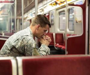 Depressed soldier on the train