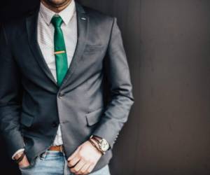 Businessman in a suit on a dark background