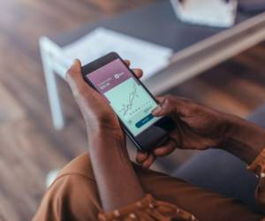 Close up of women's hands holding smartphone