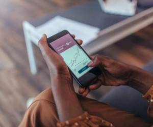 Close up of women's hands holding smartphone