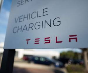 Dublin, California, United States - July 23, 2018: Close-up of sign with Tesla Motors logo in Pleasanton, California, July 23, 2018