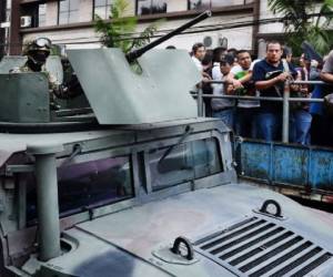 La población, víctima de los criminales y de un Estado que empezó a reaccionar algo tarde (Foto: AFP)