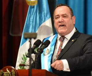 Guatemalan new President Alejandro Giammattei delivers a speech during his inauguration ceremony at the National Theater, in Guatemala City, on January 14, 2020. - The doctor right-wing Alejandro Giamattei assumes as president of Guatemala in replacement of the unpopular Jimmy Morales, with the promise of attacking corruption and contain the high levels of poverty. (Photo by Johan ORDONEZ / AFP)