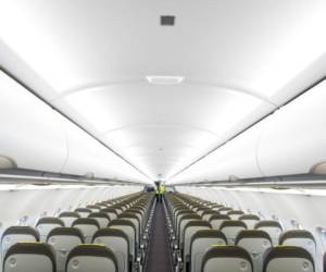 Picture shows the cabin of the new Airbus A 320 neo aircraft model presented by the Spanish low-cost airline Vueling at Barcelona's airport in El Prat de Llobregat on September 27, 2018. (Photo by Josep LAGO / AFP)