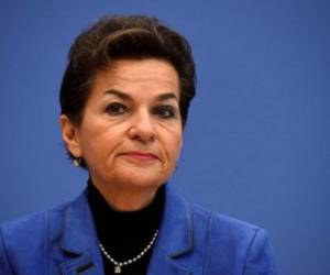 TO GO WITH AFP STORY BY LUIS TORRES DE LA LLOSA(FILES) This file photo taken on October 30, 2015 shows Executive Secretary of the United Nations Framework Convention on Climate Change (UNFCCC) Christiana Figueres addressing a news conference on the aggregation report of the national climate action plans ('Intended Nationally Determined Contributions') in Berlin. / AFP PHOTO / TOBIAS SCHWARZ