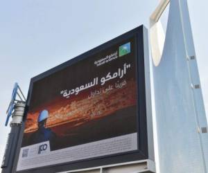 A billboard displaying an advert for Aramco is pictured in the Saudi capital Riyadh on November 10, 2019. - From robots to sniffer drones, Saudi Aramco has ramped up spending on technological innovation while its rivals cut back amid soft oil prices, but the energy giant risks losing its edge after its much-anticipated IPO. Saudi Arabia is offering a sliver of the company, touted as the kingdom's crown jewel, in its upcoming initial public offering that is the bedrock of Crown Prince Mohammed bin Salman's ambitious strategy to overhaul the oil-reliant economy. (Photo by FAYEZ NURELDINE / AFP) / The erroneous mention[s] appearing in the metadata of this photo by FAYEZ NURELDINE has been modified in AFP systems in the following manner: [november] instead of [october]. Please immediately remove the erroneous mention[s] from all your online services and delete it (them) from your servers. If you have been authorized by AFP to distribute it (them) to third parties, please ensure that the same actions are carried out by them. Failure to promptly comply with these instructions will entail liability on your part for any continued or post notification usage. Therefore we thank you very much for all your attention and prompt action. We are sorry for the inconvenience this notification may cause and remain at your disposal for any further information you may require.