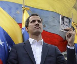 Venezuelan opposition leader and self-proclaimed acting president Juan Guaido speaks during a press conference in Caracas, on February 15, 2020. (Photo by Federico PARRA / AFP)