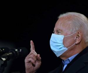 Democratic Presidential candidate and former US Vice President Joe Biden speaks at a hangar campaign event at Milwaukee Mitchell International Airport in Milwaukee, Wisconsin, on October 30, 2020. (Photo by Jim WATSON / AFP)