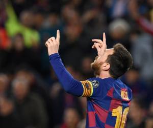 Barcelona's Argentine forward Lionel Messi celebrates after scoring a goal during the UEFA Champions League Group F football match between FC Barcelona and Borussia Dortmund at the Camp Nou stadium in Barcelona, on November 27, 2019. (Photo by Josep LAGO / AFP)