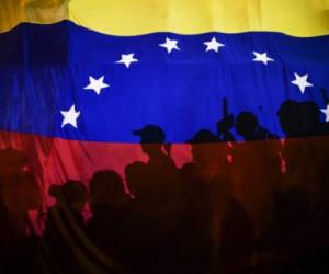 Activistas de oposición protestan el 17 de Mayo de 2017, en Caracas, Venezuela. AFP PHOTO / JUAN BARRETO