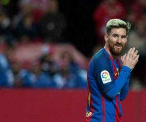 (FILES) In this file photo taken on November 6, 2016 Barcelona's Argentinian forward Lionel Messi looks on during the Spanish league football match Sevilla FC vs FC Barcelona at the Ramon Sanchez Pizjuan stadium in Sevilla. - Lionel Messi will end his 20-year career with Barcelona after the Argentine superstar failed to reach agreement on a new deal with the club, the Spanish giants announced on August 5, 2021. (Photo by JORGE GUERRERO / AFP)