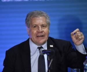 The Organization of American States Secretary General, Luis Almagro, speaks during a joint press conference with Mexico's Foreign Minister Luis Videgaray (not framed) in the framework of the 47th OAS General Assembly in Cancun, Mexico, on June 19, 2017. / AFP PHOTO / Pedro Pardo